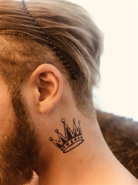 men's crown neck tattoo